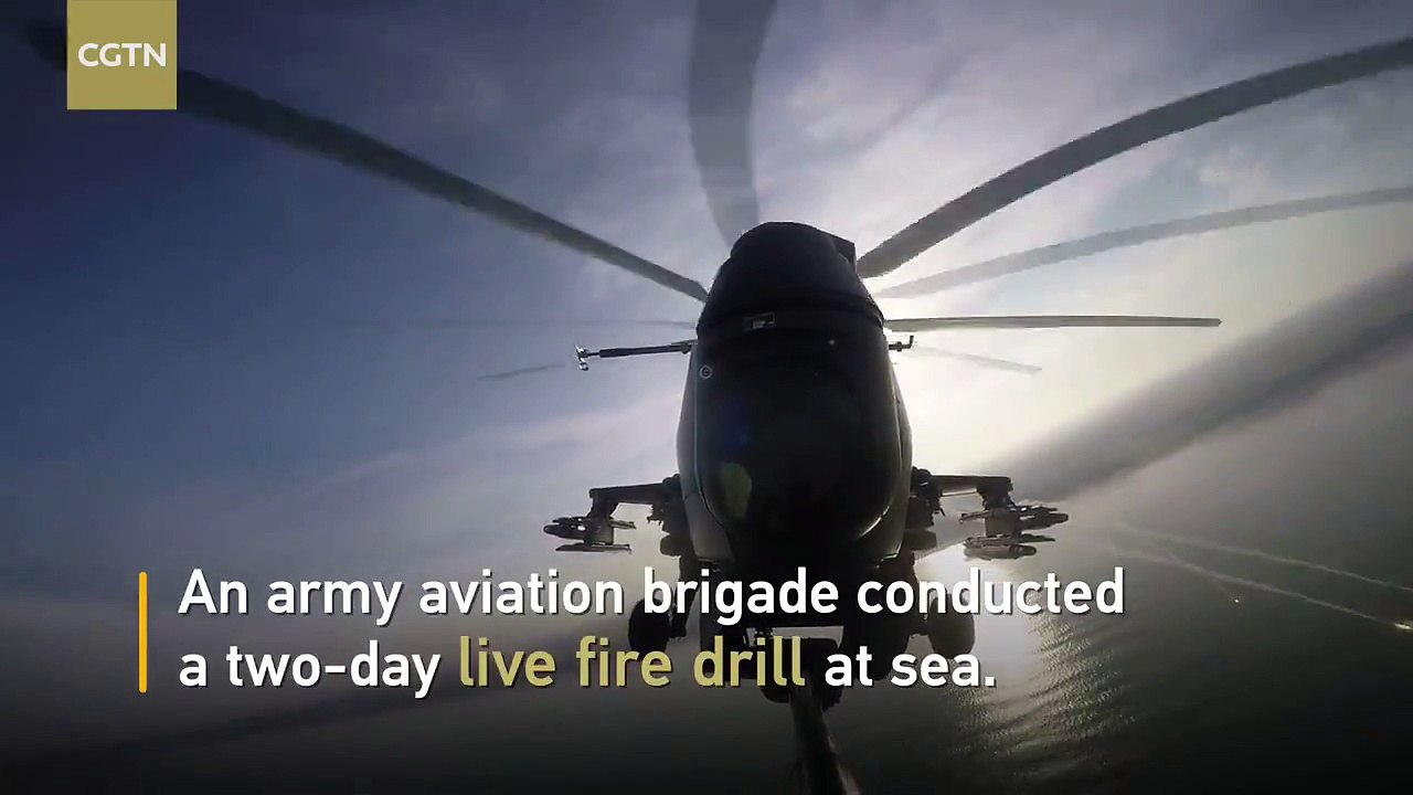 Chinese air force conducts live fire drill at sea