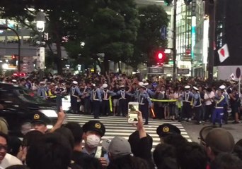 Jubilant Soccer Fans Celebrate Japan's World Cup Opening Win in Tokyo