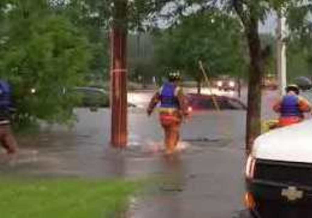 Rockford Fire Department Rescues People from Cars Submerged in Flooding
