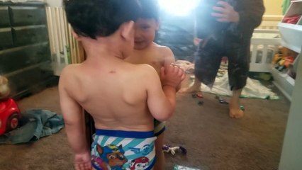 Super cute toddler boy reacts to putting his bare tummy against the mirror, but then...