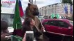 A clip of video of a Russian football fan and his bear celebrating their national team's victory has gone viral on the Chinese social media platforms. A very Ru