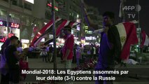 Des supporters égyptiens expriment leur déception après le match