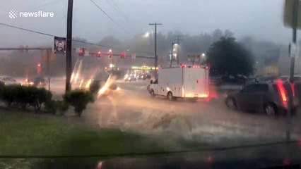 Water shoots out of manhole in Pittsburg as flash flood warning issued