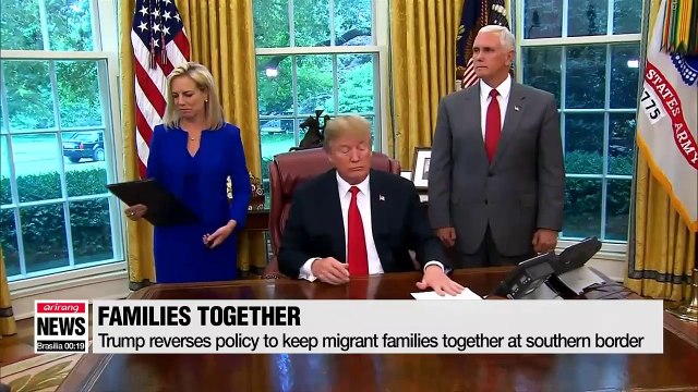Trump reverses policy to keep migrant families together at Mexican border