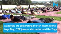 ITBP jawans perform Yoga in river and on Himalaya