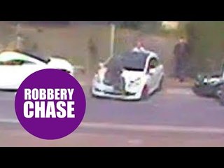 Have-a-go-hero desperately clinging to the bonnet of a getaway car