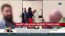 Rahip ağlayan bebeği tokatladı