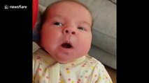 Newborn girl confused by her first sneeze