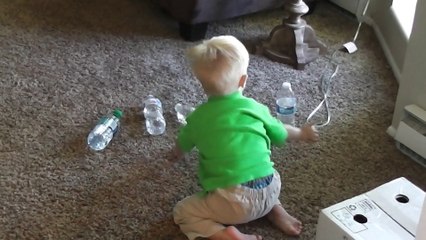 Baby Timmy Does NOT Like Bottled Waters! He Knocks Them All Down!
