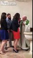 Priest baptising toddler, loses his sh*t and slaps it.