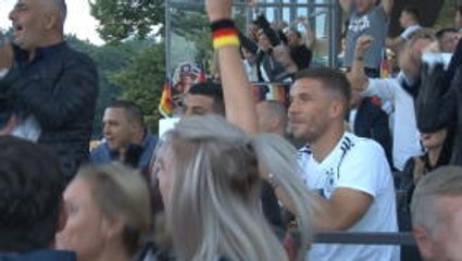 Podolski celebrates Germany late winner