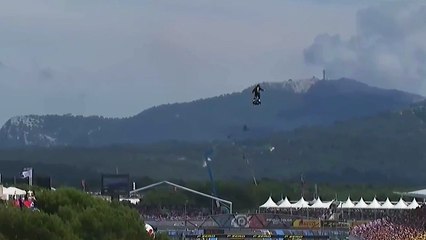 Man flies over the track on a hoverboard