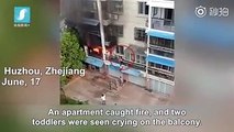 Two little girls were seen crying on the balcony when an apartment caught fire. Then, at the moment of crisis, a young man save two toddlers from danger. Local