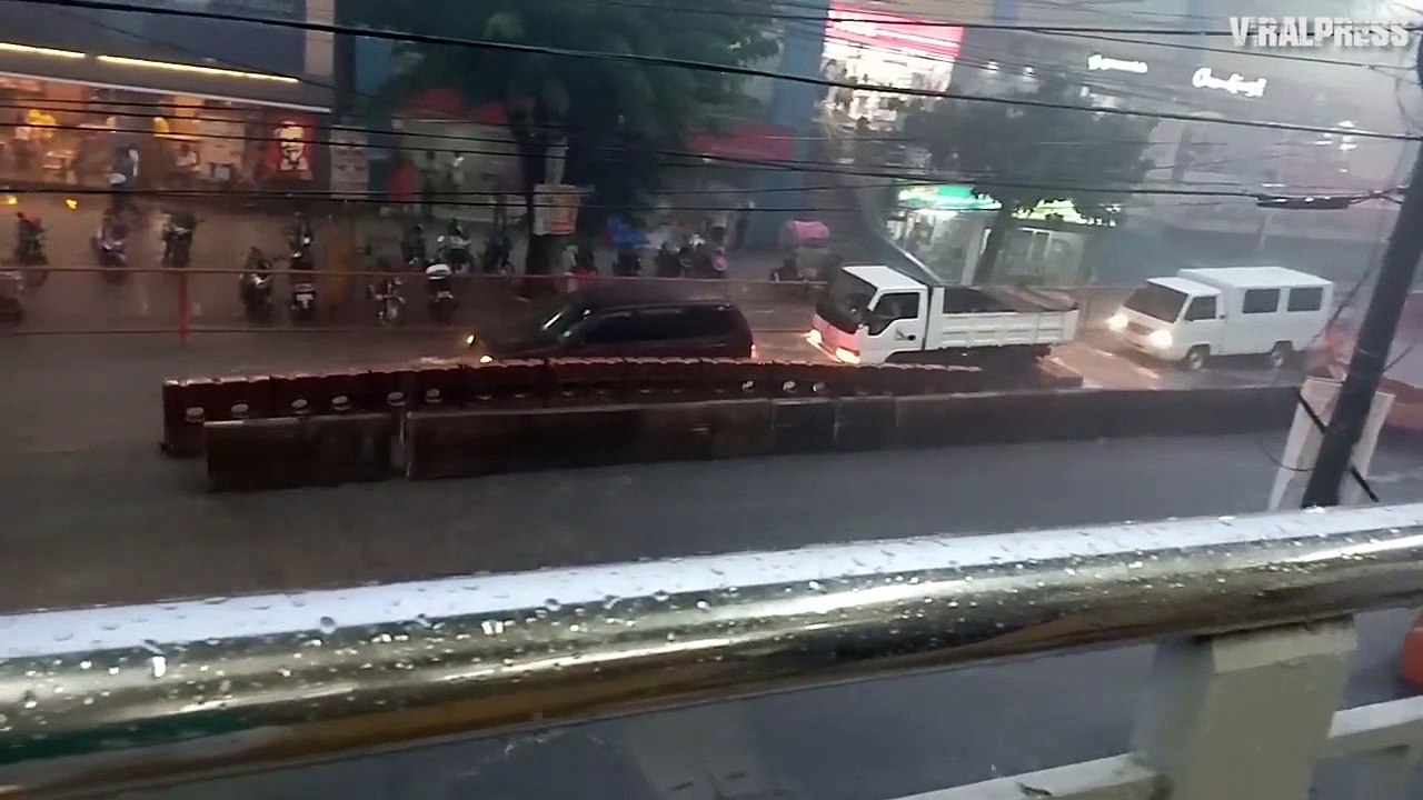 Barrier Floating Down Flooded Road
