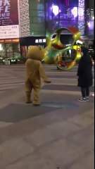 People in animal costumes playing pranks