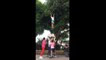 Cheerleading squad tosses friend into air to retrieve tasty mangoes