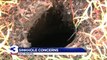 Six-Foot Sinkhole Opens Up in Memphis Couple`s Front Yard