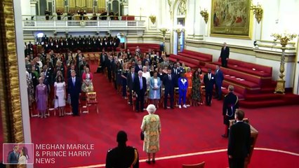 Meghan Markle Wears Pink Prada Dress With Prince Harry To Queen's Young Leaders Evening Reception