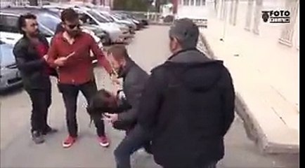 KHK ihracını protesto eden kadına yumruk kamerada