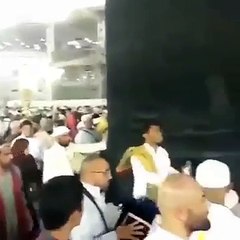 Man Throwing Petrol On Kaaba