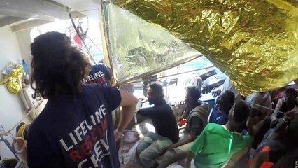 Macron says France will welcome some migrants on Lifeline ship as he confers with Pope