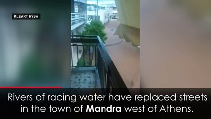 Flash floods wash away cars and debris in Greece