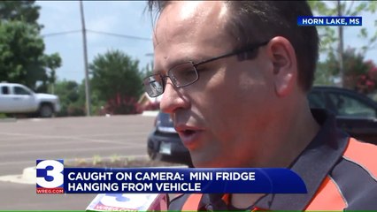 Video Shows Thief Driving Off with Mini Fridge Hanging Outside of His Car