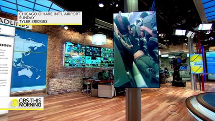 فيديو: إخراج راكب بالقوة من طائرة أمريكية