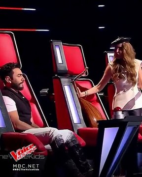 فيديو نانسي عجرم وتامر حسني بطلا المشاغبات الدائمة في ذا فويس كيدز