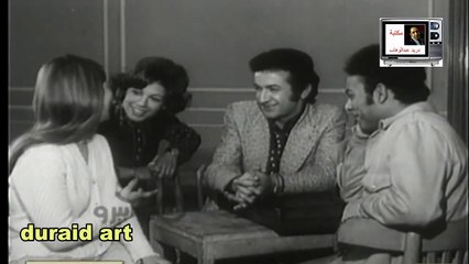 فيديو نادر جداً لنور الشريف وبوسي يلعبان الطاولة بعد زواجهما مباشرة