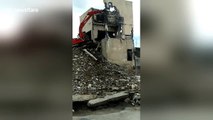 Lucky escape as digger rolls over with workman inside