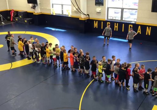 Michigan Wrestler Adam Coon Battles 50 Kids in Tug of War