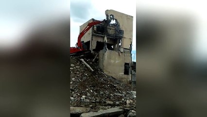 Lucky escape for worker as crane collapses with him inside it