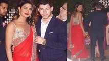 Priyanka Chopra spotted holding hands with Nick Jonas at Ambani's party; Watch Video । FilmiBeat