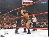 WWE - Big Show Chokeslams Undertaker Through The Ring