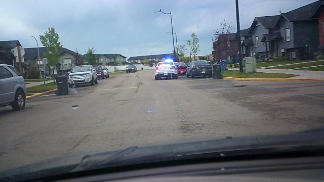 SUNP0027. SHE GOT A TICKET FOR ONE OF TWO THINGS THE PLAYGROUND ZONE BEHIND ME OR THE STOP SIGN, PLAYGROUND TICKET WILL TRIPLE HERE CAR INSURANCE, STOP $400.POLICE.COPS.