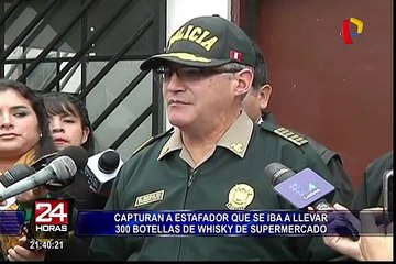 Capturan a estafador que se iba a llevar 300 botellas de whisky de supermercado