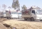Convoy of Trucks Carry Displaced People Out of Northwest Daraa City