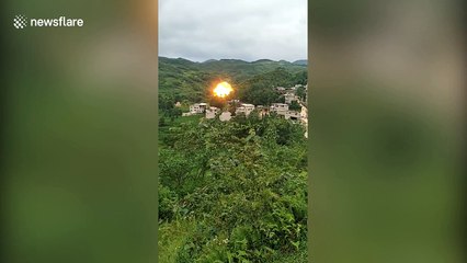 Debris from rocket lands on town in China, causing massive explosion
