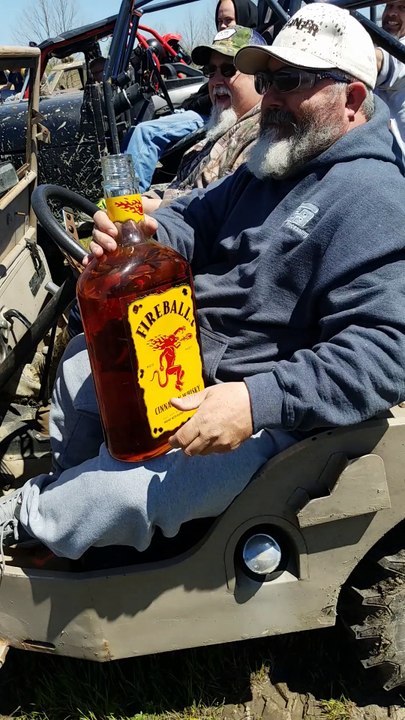 Man Swigs From Massive Fireball Bottle