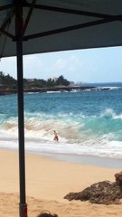 Wave Takes Out Unsuspecting Swimmer