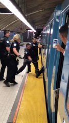 Cops Take Down Subway Passenger