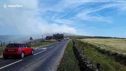 Road closed as plumes of smoke rise from another UK moor fire