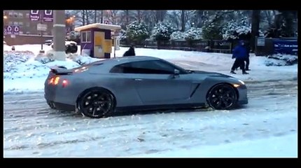 Audi R8 and Nissan GT-R in the snow.