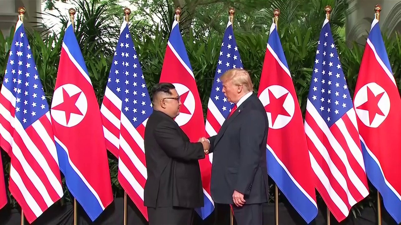 Trump And Kim Jong Un Shake Hands In Historic S...