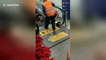 Airport crews rescue man trapped neck-deep in escalator