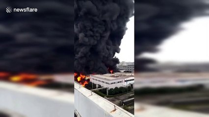 Pillar of black smoke spews from huge fire at Chinese industrial park