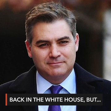 White House restores CNN journalist's credentials, with warning