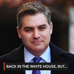 White House restores CNN journalist's credentials, with warning