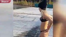 Bikiniyle donmuş göle atladı bacağını kırdı